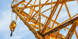Workers operating forklifts outside while other workers walk around them
